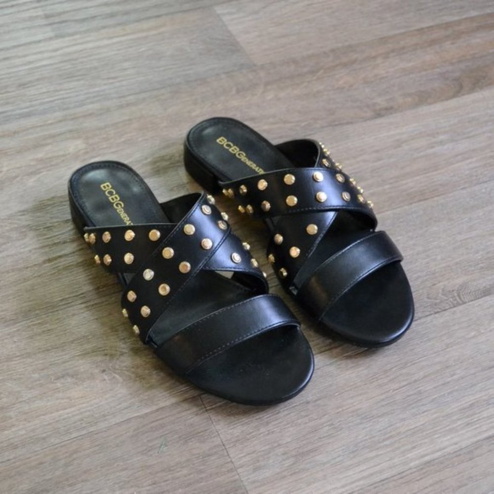 NWOB BCBGeneration Dana Edgy Studded Black and Gold Leather Sandal Size 6.5
